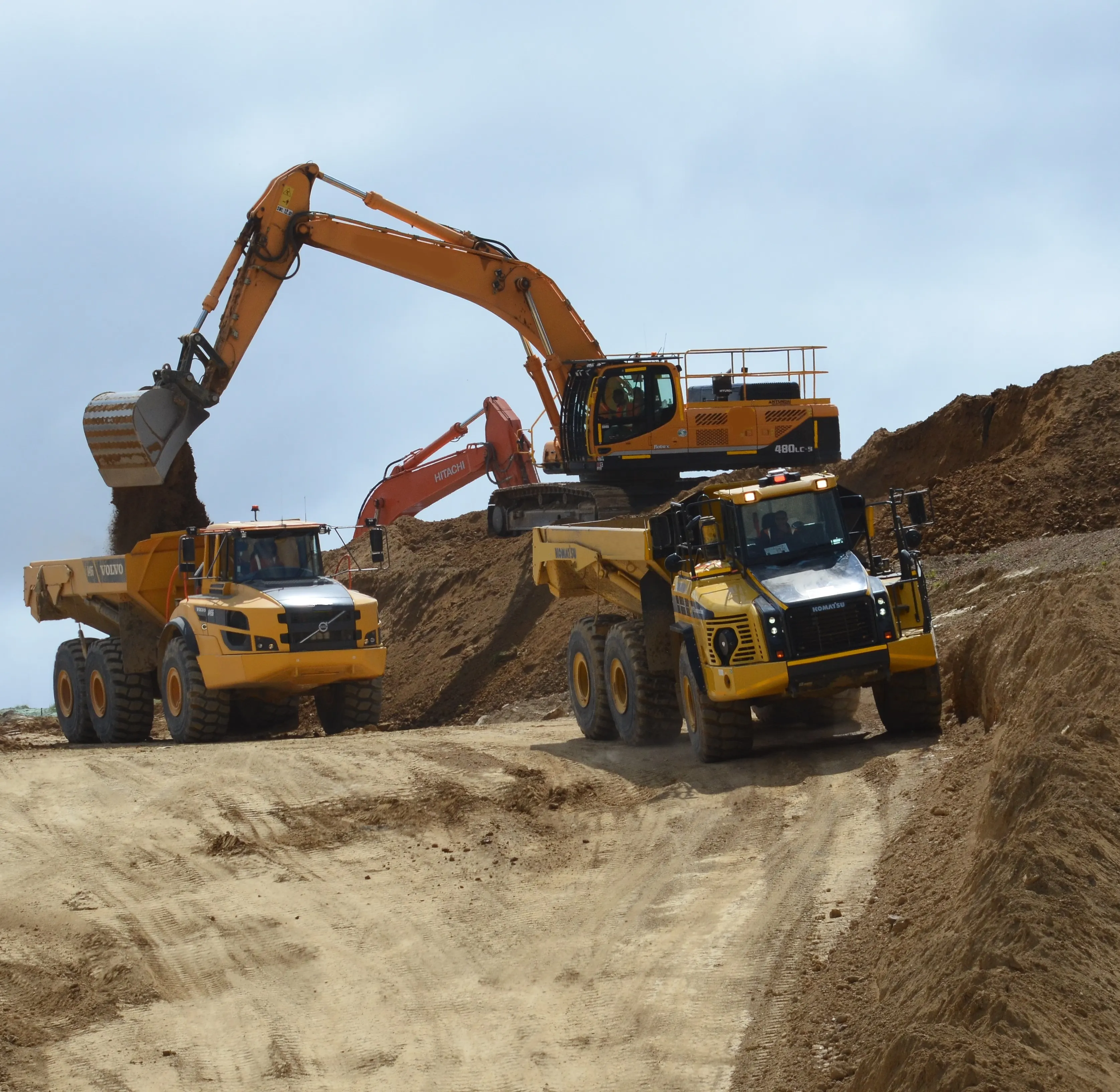 Tracked and wheeled plant on a construction site